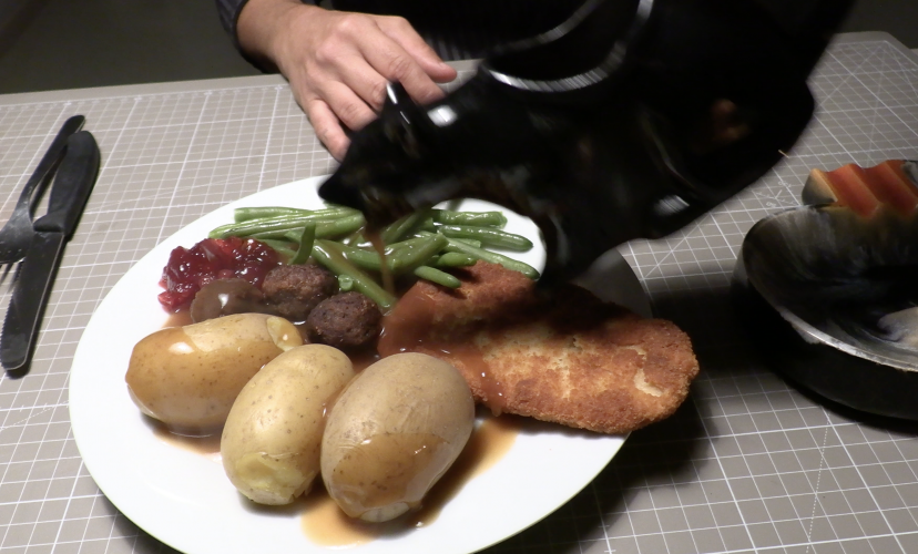 Screenshot from Advent X previous dinner scene